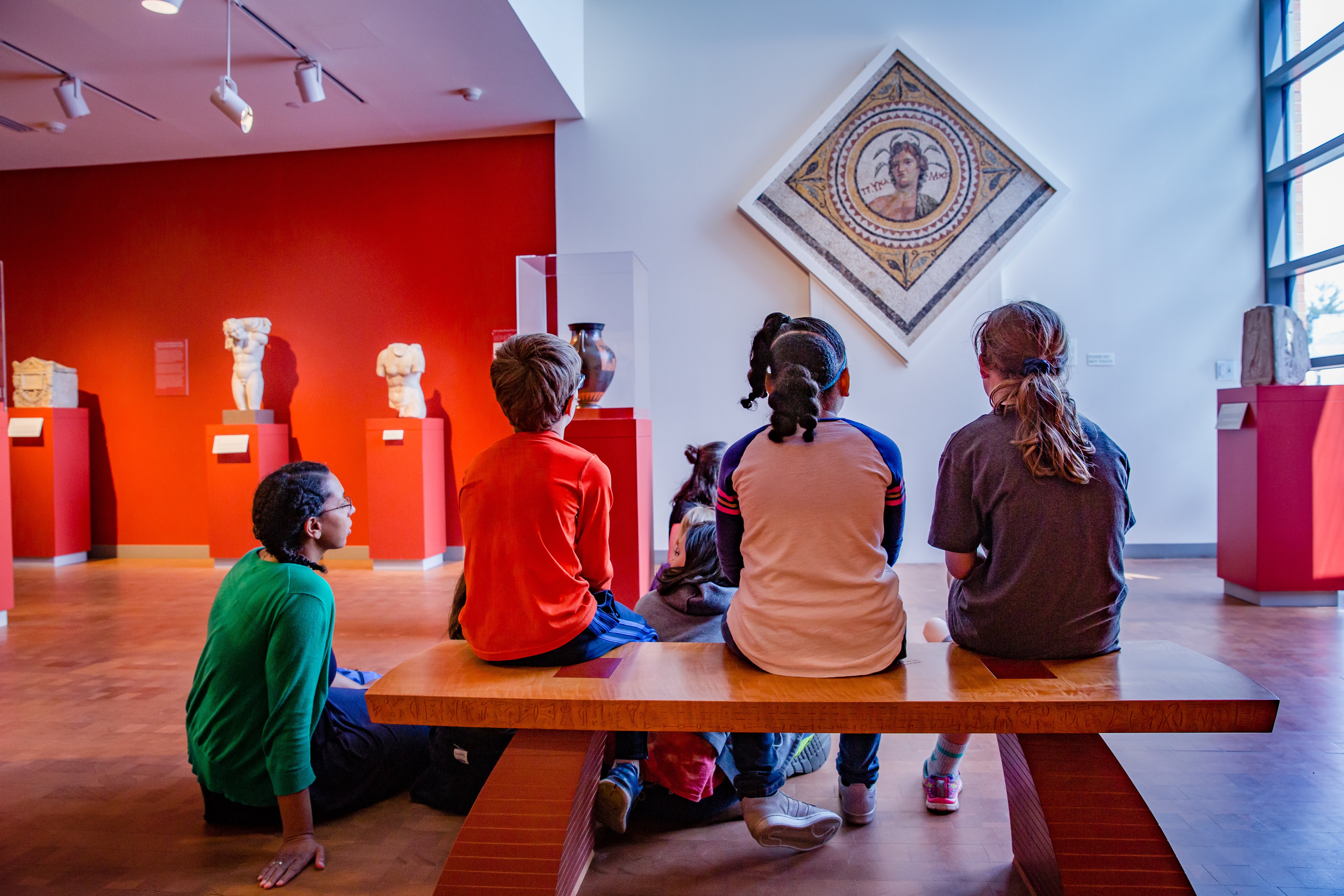students viewing artwork at the museum