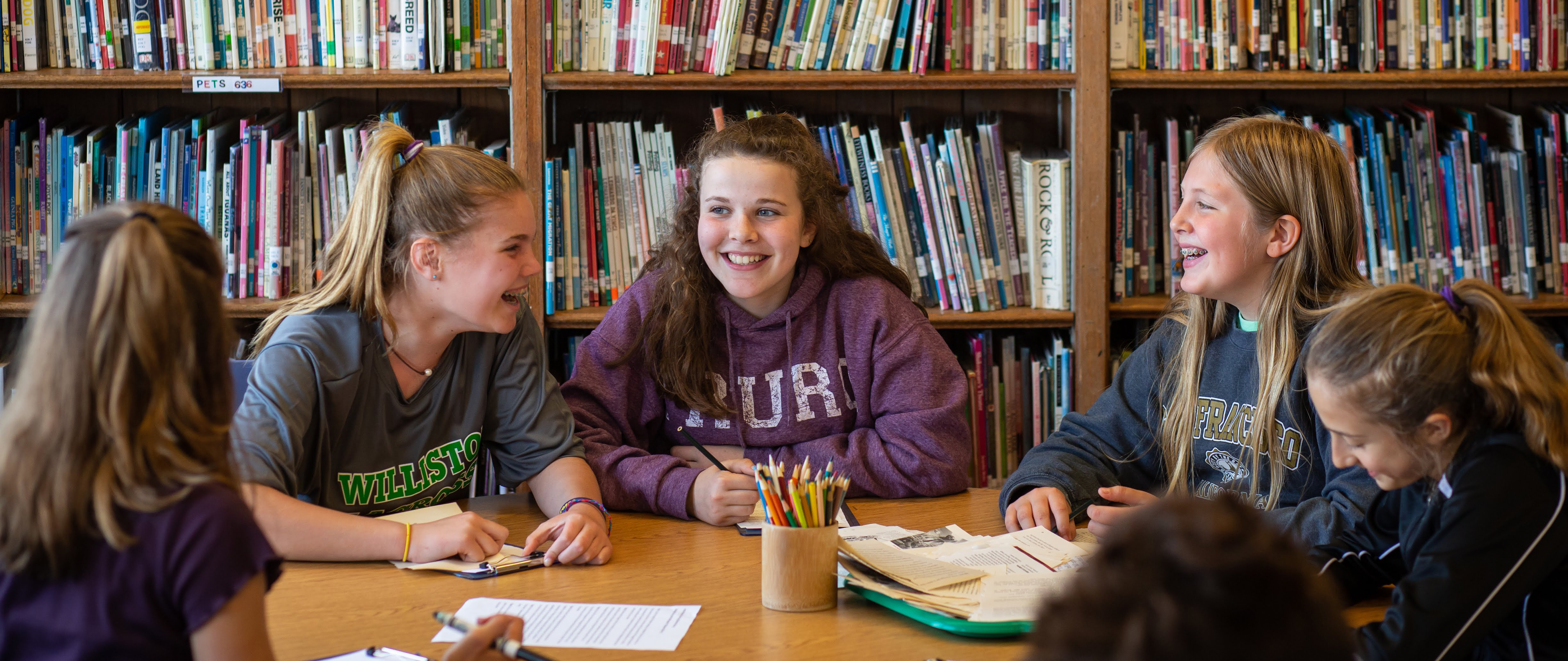 A group of students working around a table