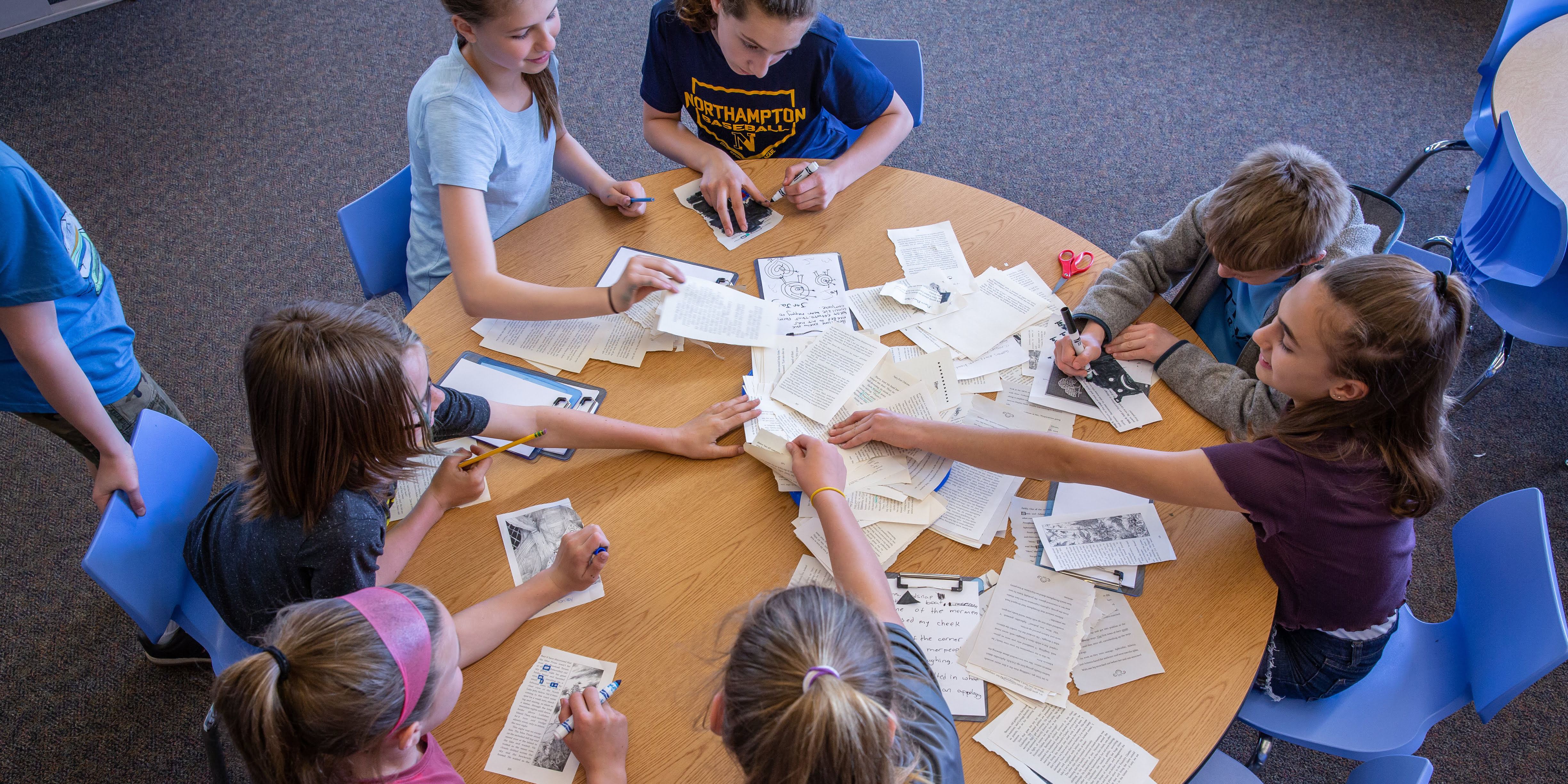 A group of students working around a table